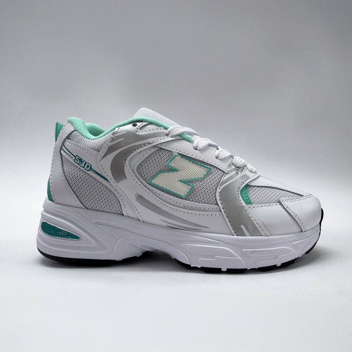 tenis 530 blanco verde menta