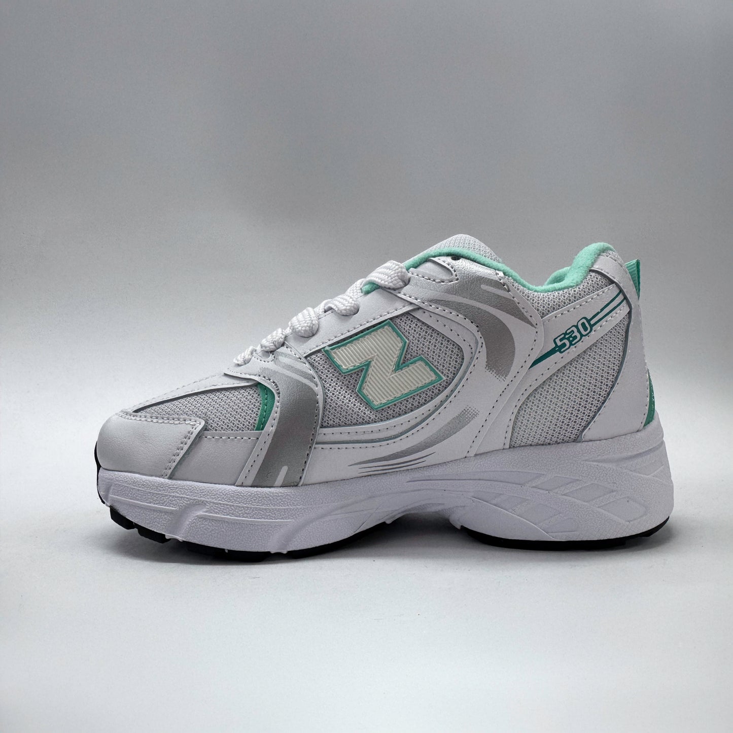 tenis 530 blanco verde menta